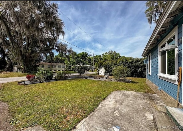 view of yard with a patio area