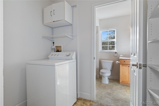 clothes washing area with washer / clothes dryer