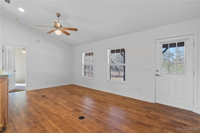 foyer featuring vaulted ceiling, ceiling fan, and wood-type flooring