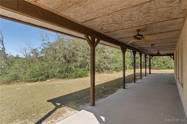 view of patio featuring ceiling fan