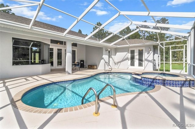 4340 W Mustang Blvd, Beverly Hills, FL 34465 - view of swimming pool featuring french doors, a patio, a pool with connected hot tub, and a lanai