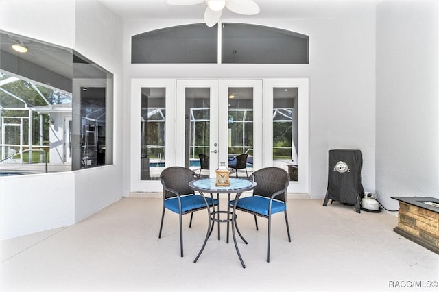 view of patio / terrace with a lanai and ceiling fan