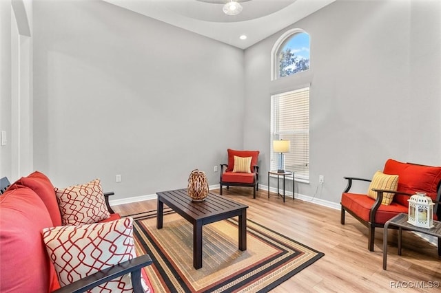 4340 W Mustang Blvd, Beverly Hills, FL 34465 - living area with light wood finished floors, a high ceiling, ceiling fan, baseboards, and recessed lighting