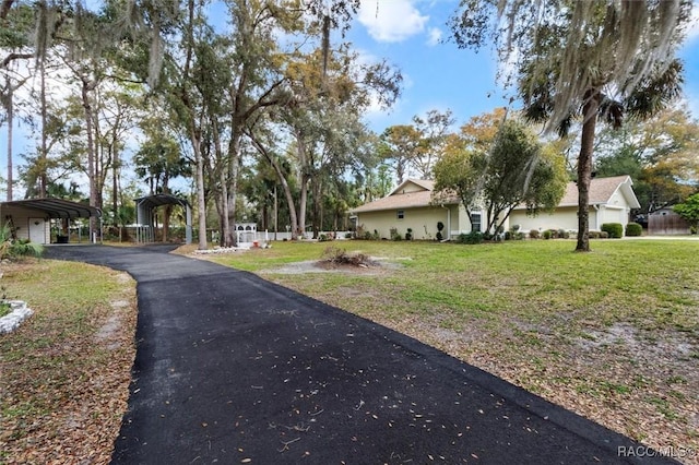 view of street with aphalt driveway