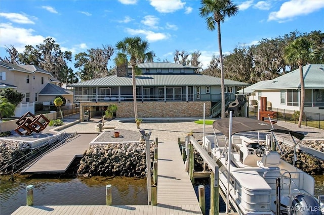 dock area with a water view