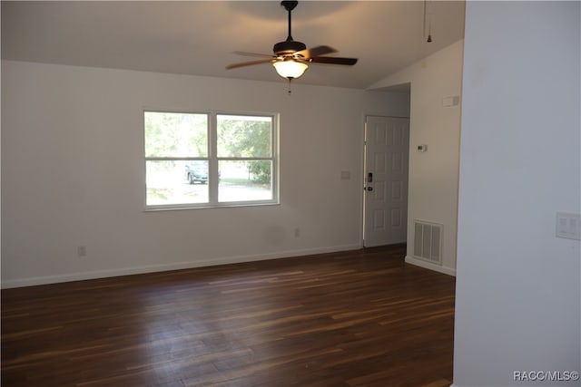 unfurnished room featuring ceiling fan and dark wood-type flooring