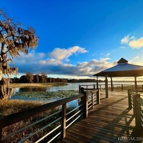 dock area featuring a water view and a gazebo