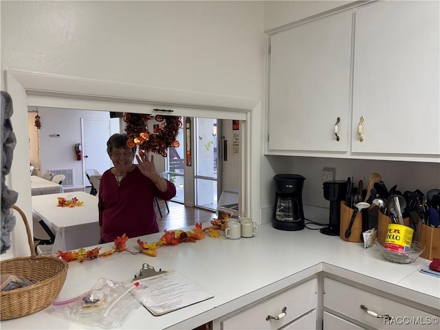 kitchen with white cabinets