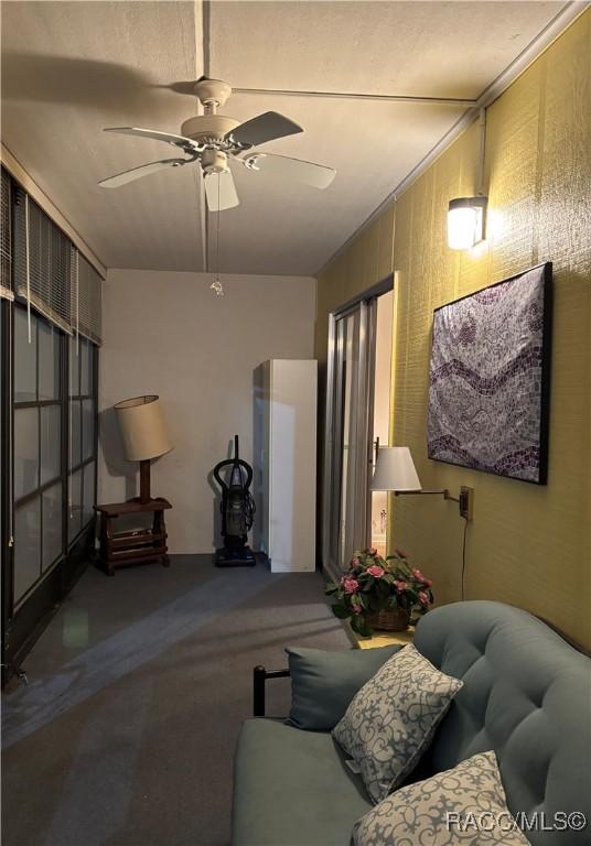 living room with ceiling fan