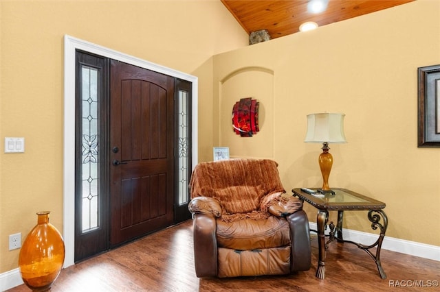 entryway with lofted ceiling, wood-type flooring, and wooden ceiling