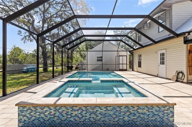 9885 E Lindale Ct, Inverness, FL 34450 - view of pool featuring a patio, a pool with connected hot tub, and glass enclosure