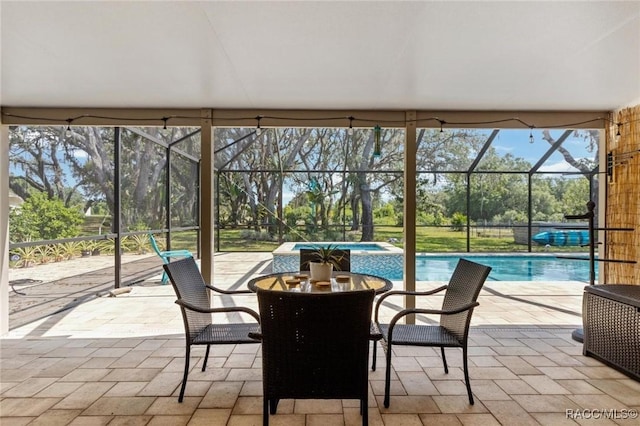 9885 E Lindale Ct, Inverness, FL 34450 - sunroom / solarium with a swimming pool, a jacuzzi, and view of scattered trees