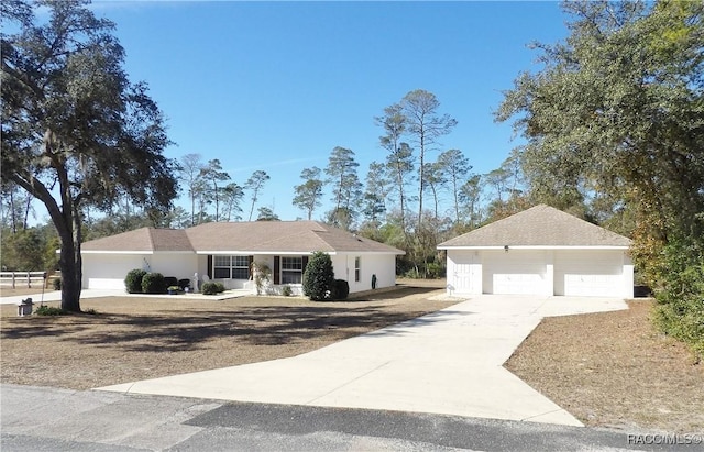 single story home featuring a garage