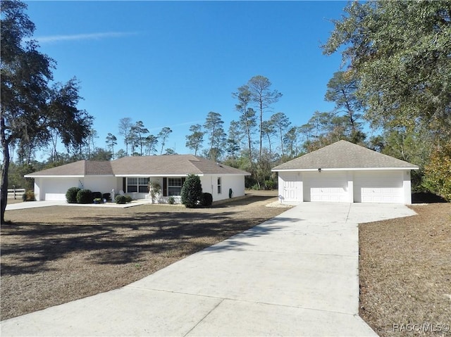 single story home featuring a garage