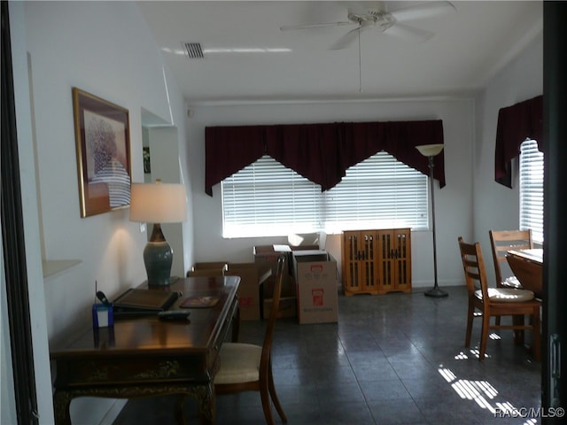 dining area with ceiling fan