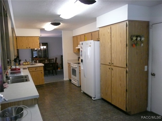 kitchen with a textured ceiling, white appliances, sink, and exhaust hood