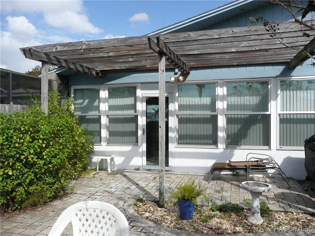 exterior space featuring a pergola and a patio