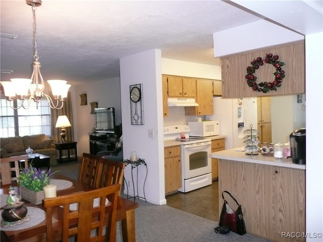 kitchen with light brown cabinets, white appliances, hanging light fixtures, and an inviting chandelier