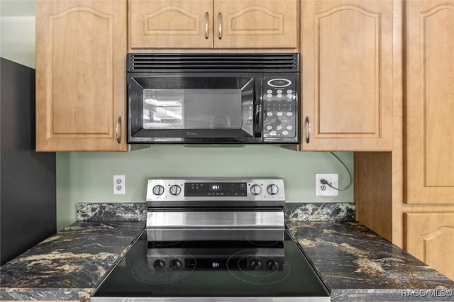 520 S Jefferson St, Beverly Hills, FL 34465 - kitchen with dark stone countertops, stainless steel electric stove, light brown cabinetry, and black microwave