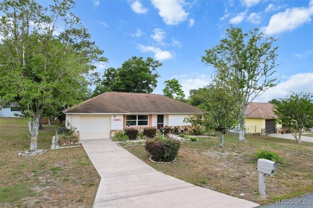 520 S Jefferson St, Beverly Hills, FL 34465 - ranch-style house with a garage, stucco siding, and driveway