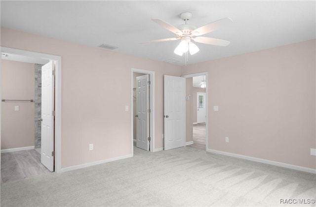 8880 N Circular Way, Citrus Springs, FL 34434 - unfurnished bedroom featuring carpet flooring and a ceiling fan