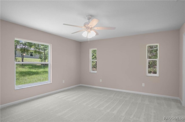 8880 N Circular Way, Citrus Springs, FL 34434 - unfurnished room featuring light carpet and ceiling fan