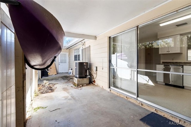 view of patio / terrace with visible vents and central AC unit