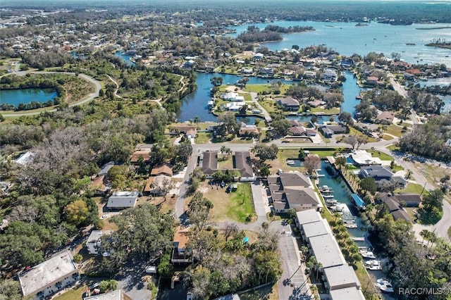 birds eye view of property featuring a residential view and a water view