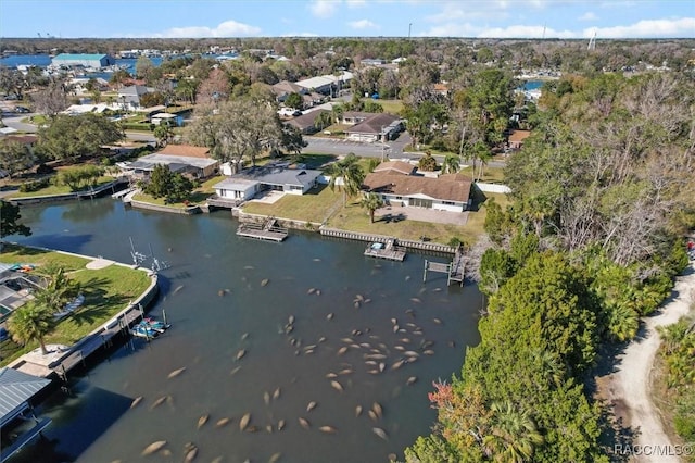 bird's eye view featuring a residential view and a water view