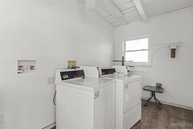 common laundry area with washing machine and dryer, baseboards, and wood finished floors