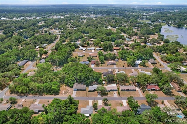 bird's eye view featuring a residential view and a water view