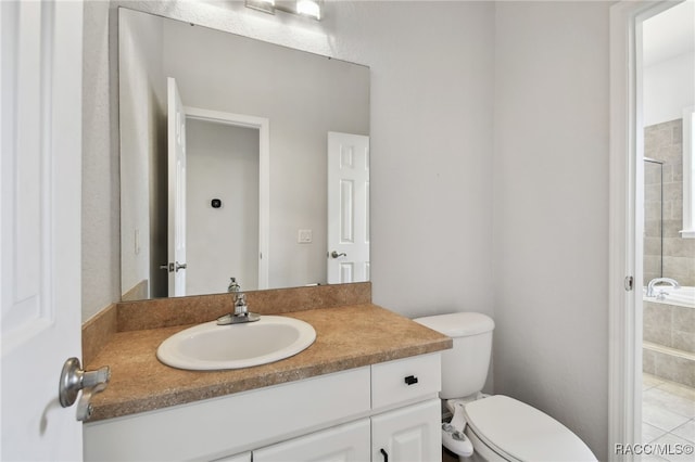 bathroom with tile patterned flooring, vanity, toilet, and a shower with door