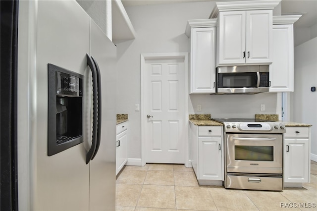 kitchen featuring light tile patterned floors, white cabinets, stainless steel appliances, and stone countertops