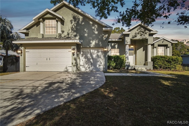 view of front of house with a garage