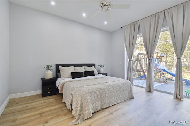 bedroom with access to exterior, light hardwood / wood-style flooring, and ceiling fan