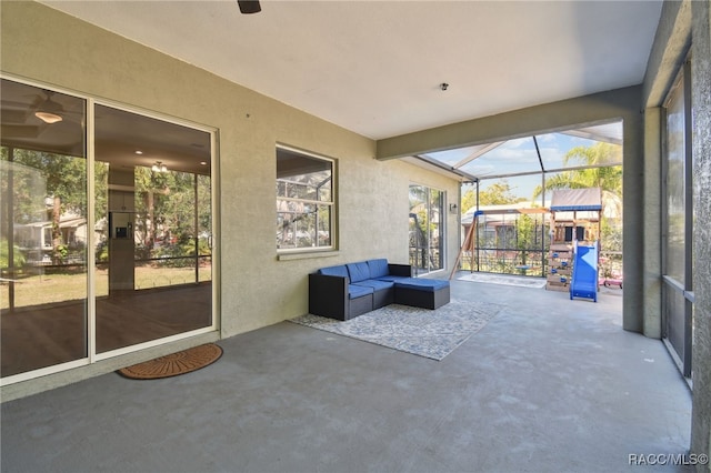 sunroom with beam ceiling