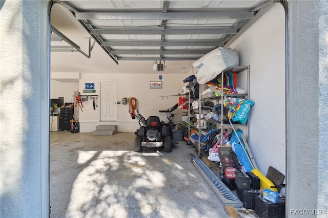 garage featuring a garage door opener