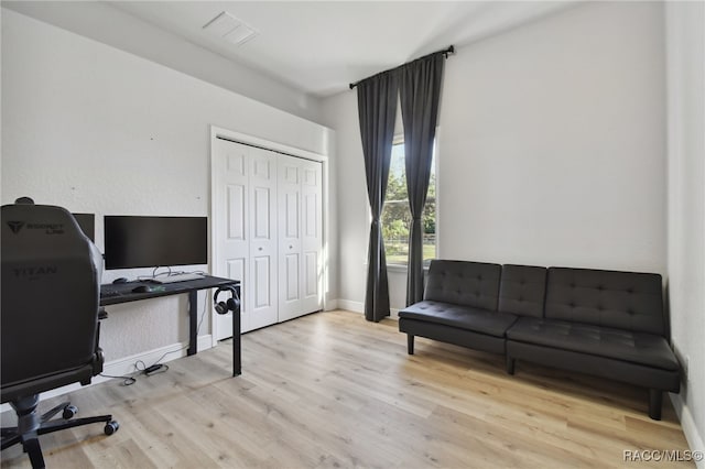 office area with light wood-type flooring