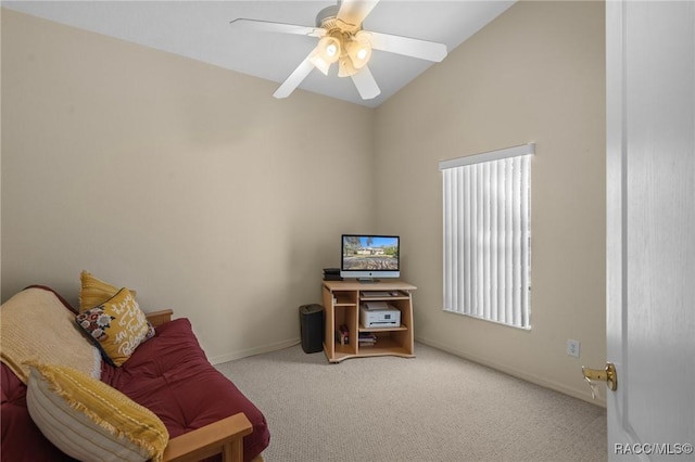 living area with vaulted ceiling, baseboards, a ceiling fan, and carpet floors