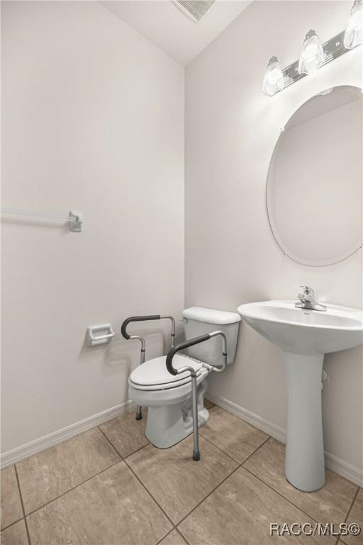 1328 W Diamond Shore Loop, Hernando, FL 34442 - half bathroom featuring tile patterned flooring and baseboards