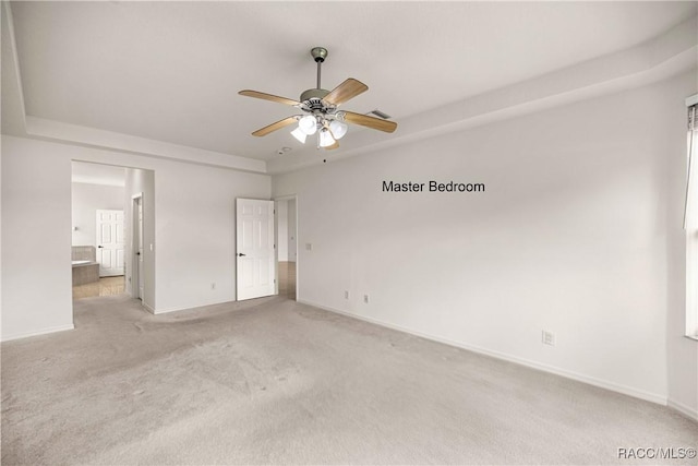 1328 W Diamond Shore Loop, Hernando, FL 34442 - unfurnished bedroom featuring light carpet, ensuite bathroom, and ceiling fan
