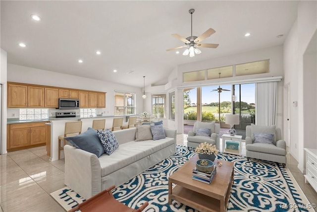 1328 W Diamond Shore Loop, Hernando, FL 34442 - living room featuring high vaulted ceiling, recessed lighting, a ceiling fan, and light tile patterned floors