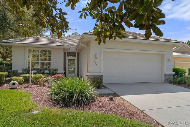 ranch-style home with a garage