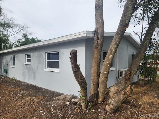 view of property exterior with ac unit