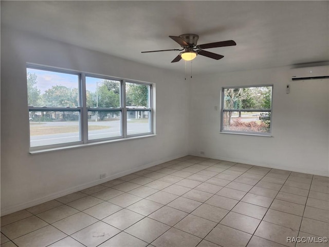 tiled empty room with a wall mounted AC and ceiling fan