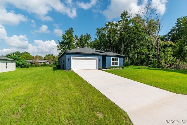 9276 N Alpinia Dr, Citrus Springs, FL 34434 - view of front facade featuring stucco siding, a garage, a front lawn, driveway, and central air condition unit