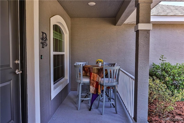 view of patio / terrace featuring a balcony