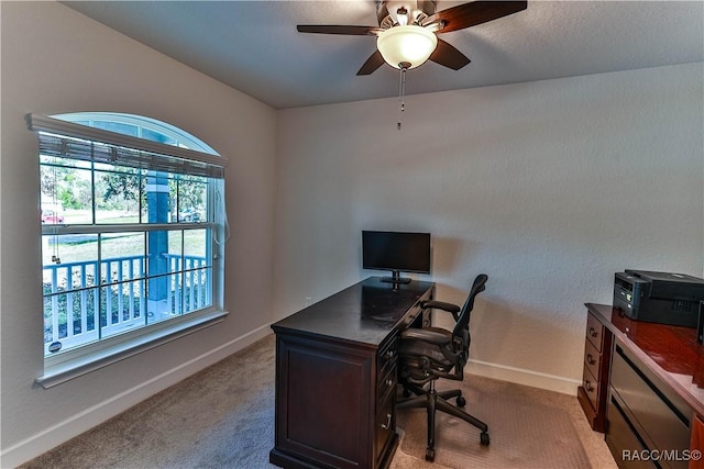 office featuring light colored carpet and ceiling fan