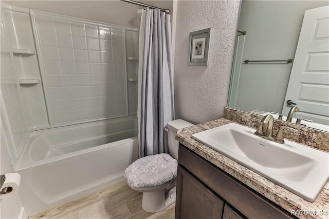 full bathroom with toilet, vanity, and shower / bathtub combination with curtain