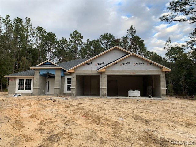 property under construction featuring a garage